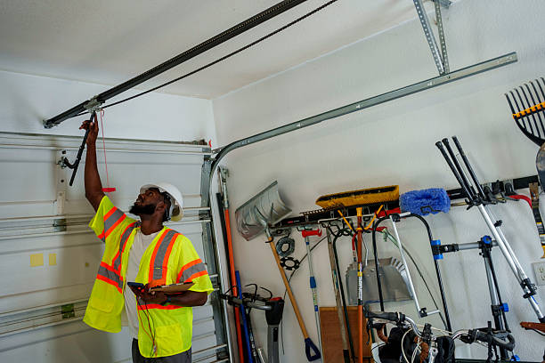Professional Garage Door Roller Replacement technician working in Plainedge, NY